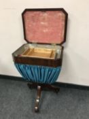 A Regency mahogany work table on three way support,