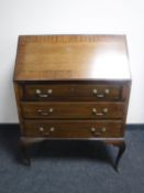 An early 20th century mahogany bureau