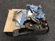 A tray of two Stanley wood working planes, mitre tools,