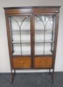 A Victorian inlaid mahogany double door display cabinet