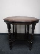 An octagonal mahogany occasional table