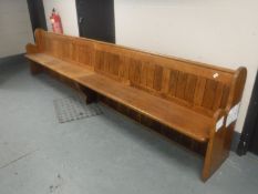 A pitch pine church pew,