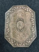 An early twentieth century Arts and Crafts panel elaborately decorated with peacock and eastern