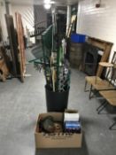 A plastic bin of garden tools - rakes, bamboo rods, window baskets etc box of bird houses,