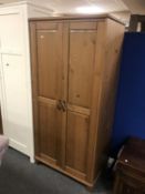 A pine double door wardrobe