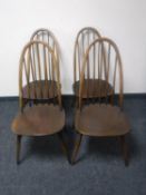 A set of four Ercol high backed dining chairs