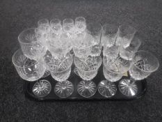 A tray containing assorted lead crystal drinking glasses