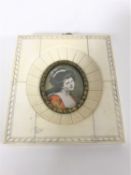 A portrait miniature depicting a lady wearing a red dress, 9.5 cm x 10.5 cm.