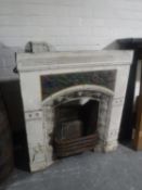 A Victorian cast iron fire insert