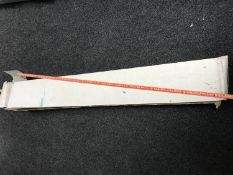 A box of carpet gripper rods