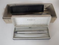 A collection of vintage pens including Parker