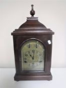 A German bracket clock on bun feet