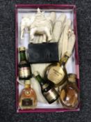 A box of vintage calf skin gloves, carved elephant figure,