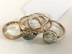 Two 18ct gold band rings, a 9ct gold band ring,