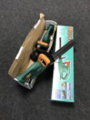 A Bosch hedge trimmer and two Performance hedge trimmers