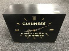 A painted Smiths Enfield mantel clock bearing Guinness advertising