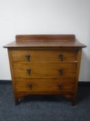 An Edwardian pine three drawer chest