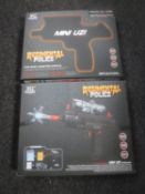 Two boxed Regimental Police mini uzi water guns