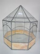 An antique leaded glass terrarium