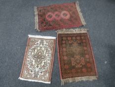 Three Iranian hearth rugs