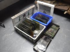 Four boxes of antique stained glass panels and two stained glass windows