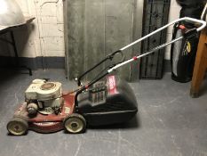 A Mountfield Stratton petrol lawn mower