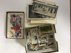 A collection of French postcards, early 20th century humorous postcards,