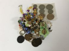 A heart-shaped trinket box containing 9ct gold stone-set eternity ring (3.