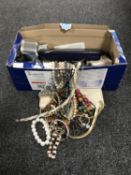 A box of assorted costume jewellery