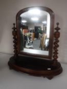 A Victorian mahogany dressing table mirror with barley twist supports