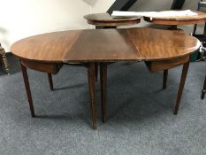 A Victorian mahogany D-end dining table with leaf