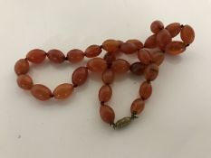 An amber type bead necklace