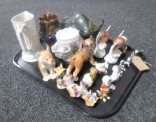 A tray of continental figures, pottery bull money box, copper lustre jug,
