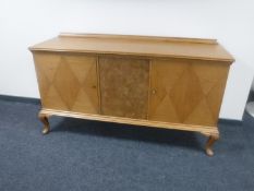 A continental oak sideboard