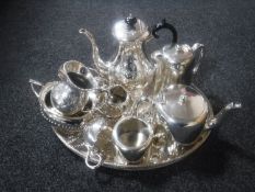 A plated gallery tray containing ten pieces of plated tea ware