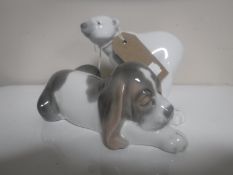 Two Lladro figures - sleeping dog and polar bear