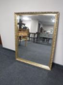 A gilt framed overmantel mirror