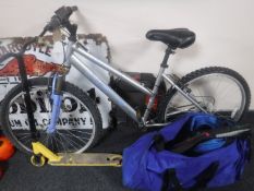 A girl's Apollo mountain bike, scooter,