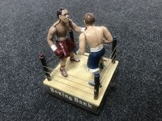 A cast iron novelty boxing bank money box