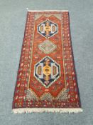 A Caucasian design runner on red ground,