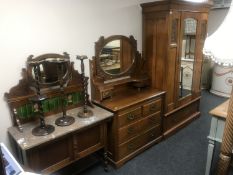 A three piece Art Nouveau walnut bedroom suite