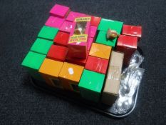 A tray of Tetley Tea Folk ornaments and spoons