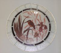 A circular leaded glass panel with hand painted 