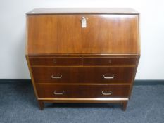 A mid 20th century continental mahogany bureau
