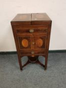 A 19th century inlaid mahogany bedside cupboard,