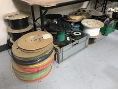 A large quantity of wire on spools