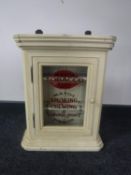 A painted pine wall cabinet bearing Mayos Tobacco advertising