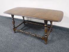An Ercol elm coffee table