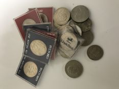 A tin of assorted crowns