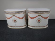 A pair of contemporary Art Deco style painted cupboards